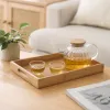 تحتوي صحون صغيرة من الخيزران البني الخفيف تحتوي على صحون صغيرة من الشاي في غرف المعيشة المنزلية، على نسيم الشمال الاسكندنافية details Picture